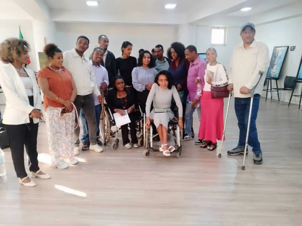 Group photo of Inclusive Growth community members, partners, and persons with disabilities advocating together